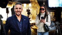 Mauricio Umansky and Kyle Richards with a set behind them