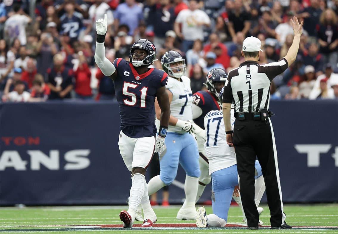 Houston Texans defensive end Will Anderson Jr. (51) celebrates his sack against Tennessee Titans quarterback Ryan Tannehill (17) in the second quarter at NRG Stadium.