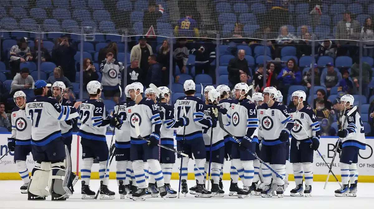 The Winnipeg Jets celebrate a win over the Buffalo Sabres at KeyBank Center.