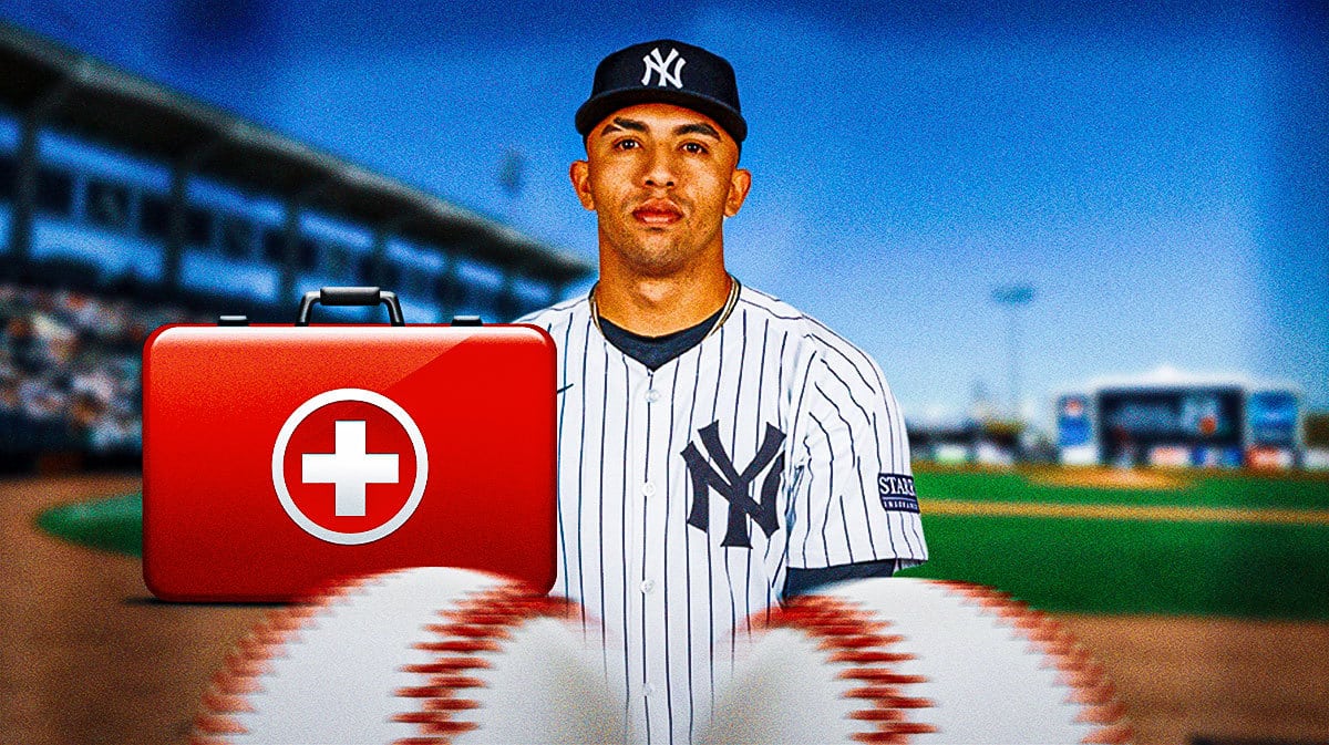 Photo: Oswald Peraza looking serious in Yankees jersey, medical kit beside him, Yankee Stadium as background