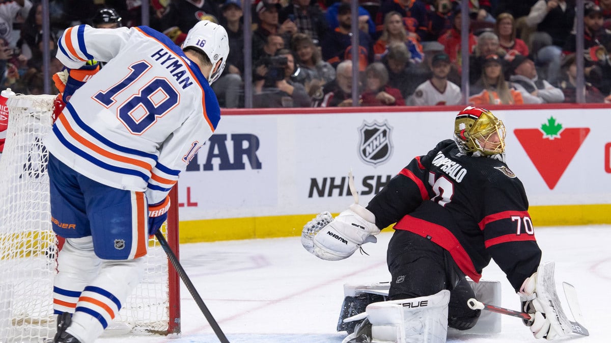 Edmonton Oilers left wing Zach Hyman (18) scores against Ottawa Senators goalie Joonas Korpisalo (70) in the second period at the Canadian Tire Centre.