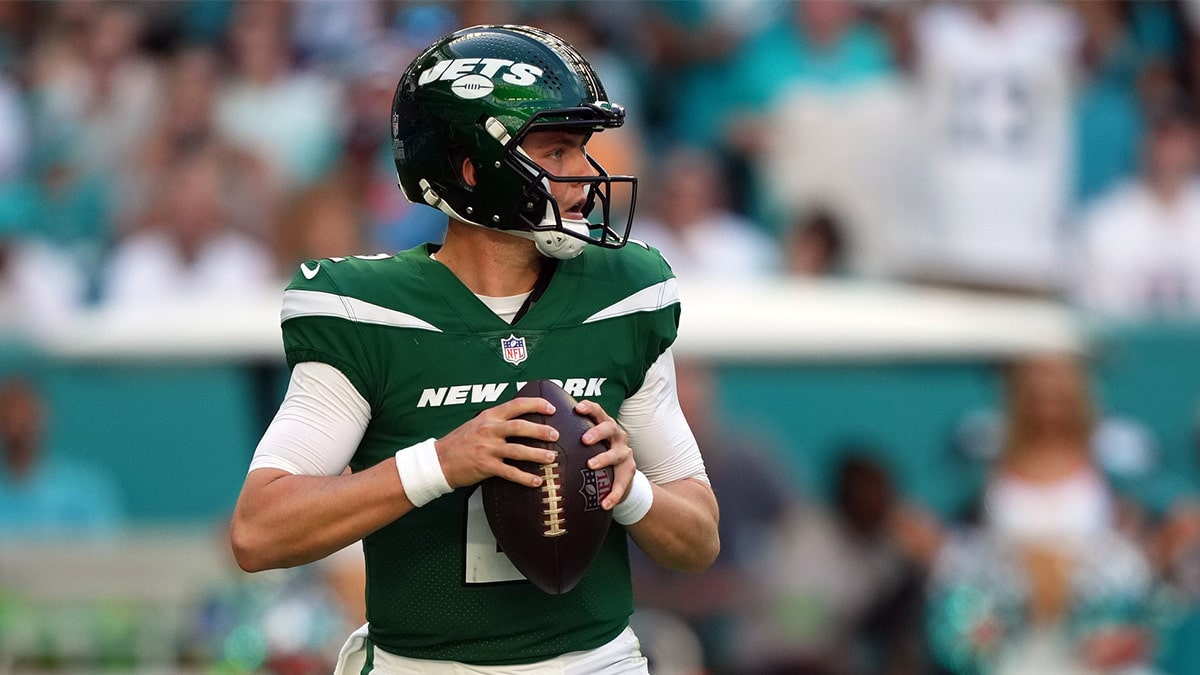 New York Jets quarterback Zach Wilson (2) drops back to attempt a pass against the Miami Dolphins during the first half at Hard Rock Stadium.