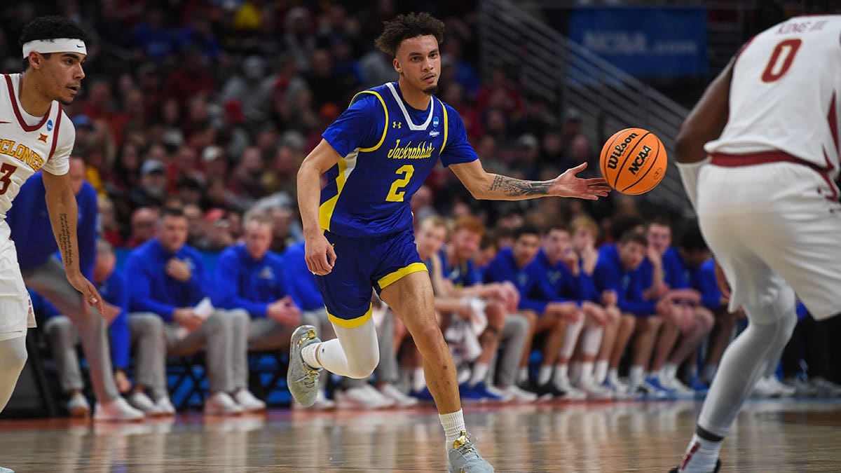 South Dakota State's guard Zeke Mayo (2) passes the ball to a teammate during the first half on Thursday, March 21, 2024 at the CHI Health Center in Omaha, Nebraska.