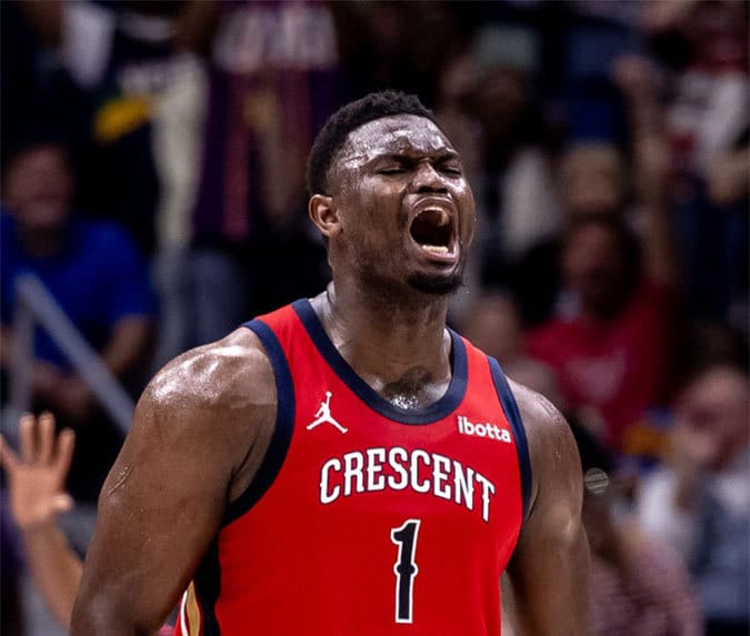 New Orleans Pelicans forward Zion Williamson (1) reacts to making a basket against the Portland Trail Blazers during the first half at Smoothie King Center. 