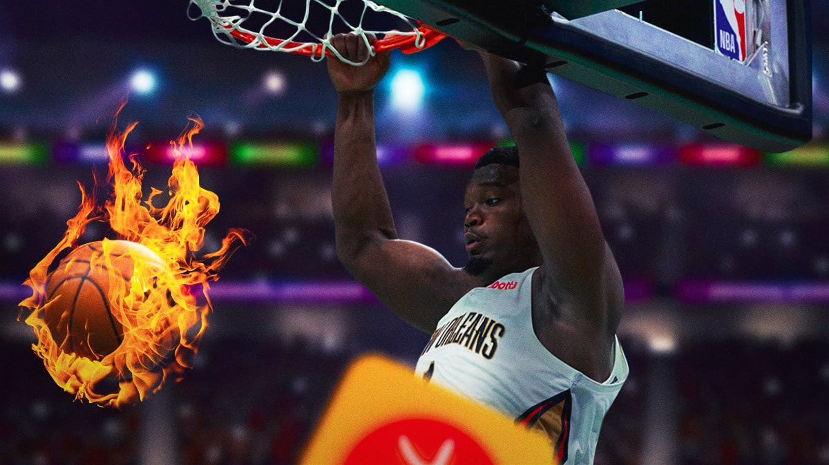 Zion Williamson dunking a basketball with fire coming off the ball.