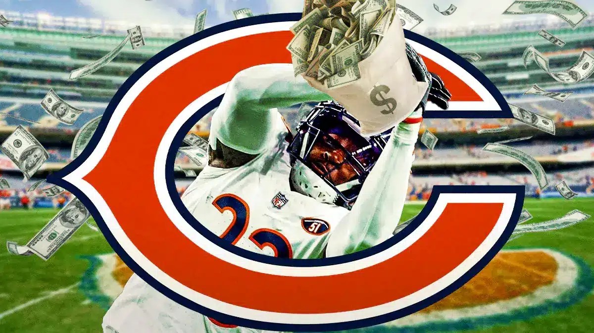 Jaylon Johnson intercepting a bag of money through a Bears logo at Soldier Field