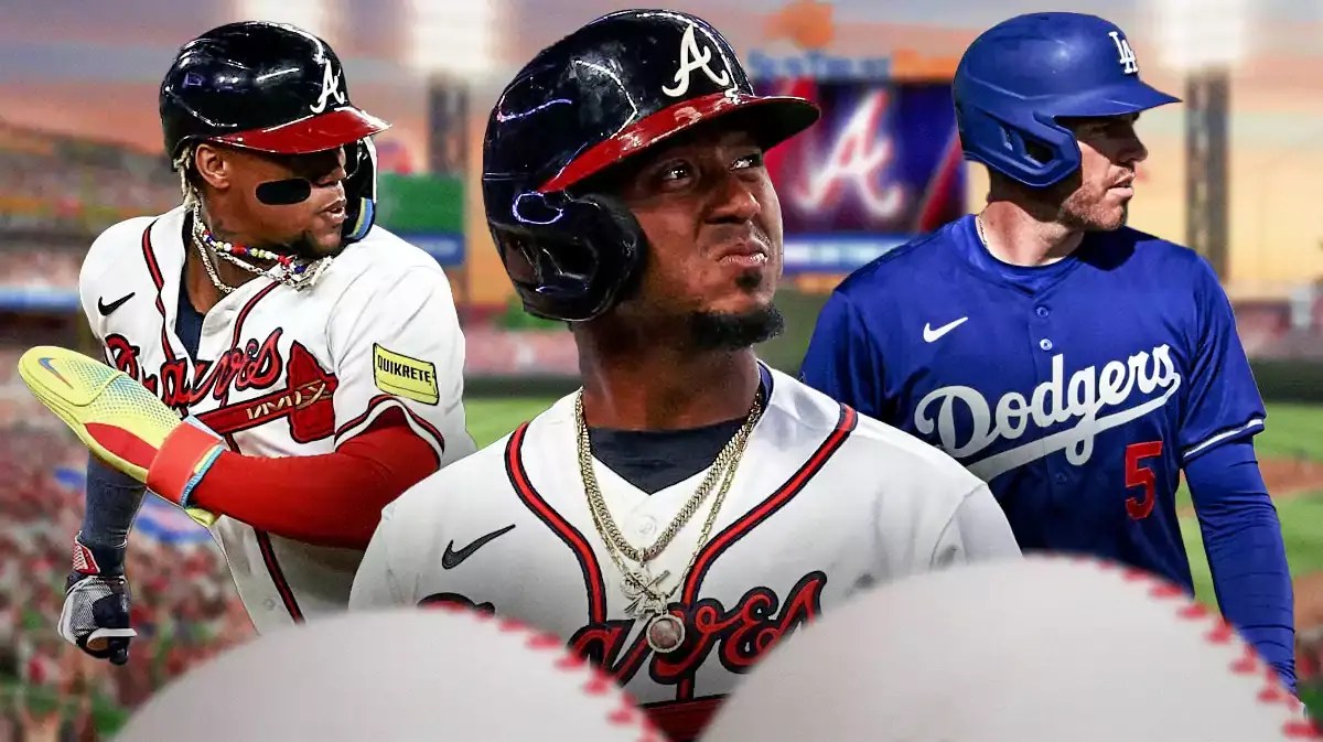 Braves' Ozzie Albies in front looking serious. In background on left, Braves' Ronald Acuna Jr. In background on right, Dodgers' Freddie Freeman.