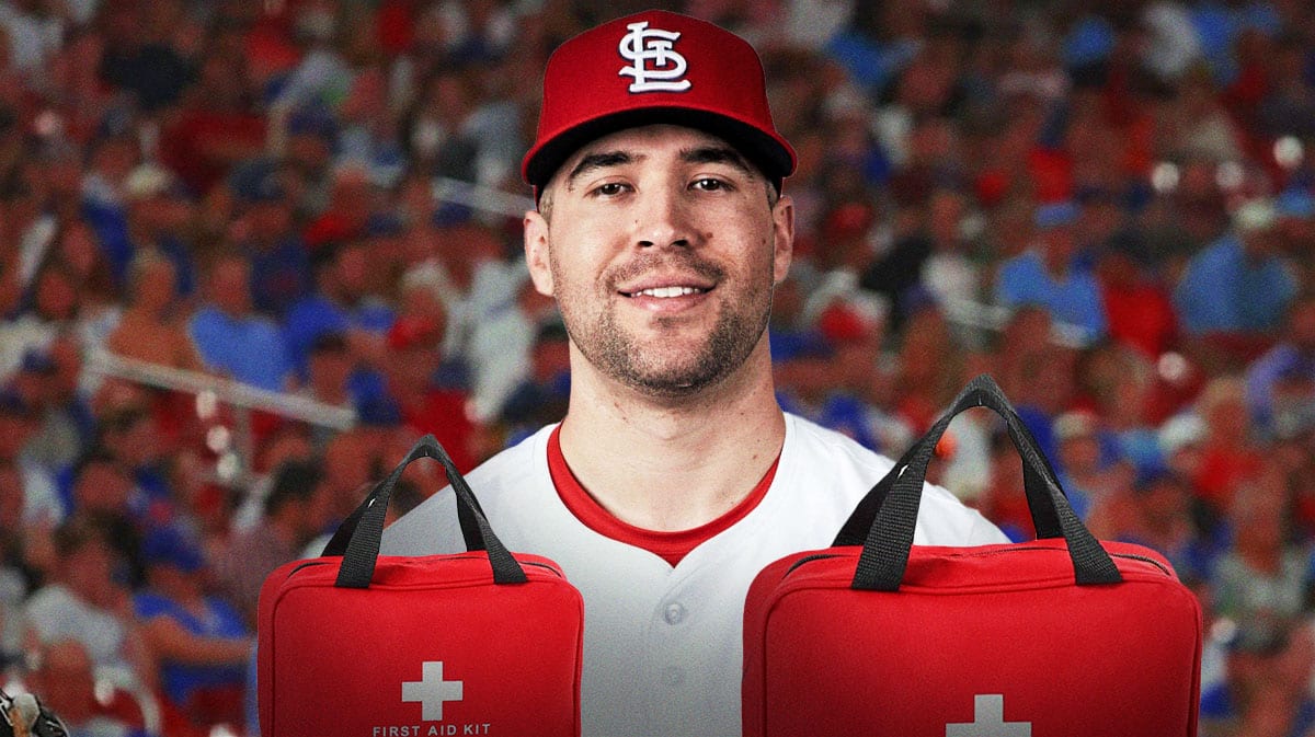 St. Louis Cardinals outfielder Dylan Carlson, with medical bag on him.