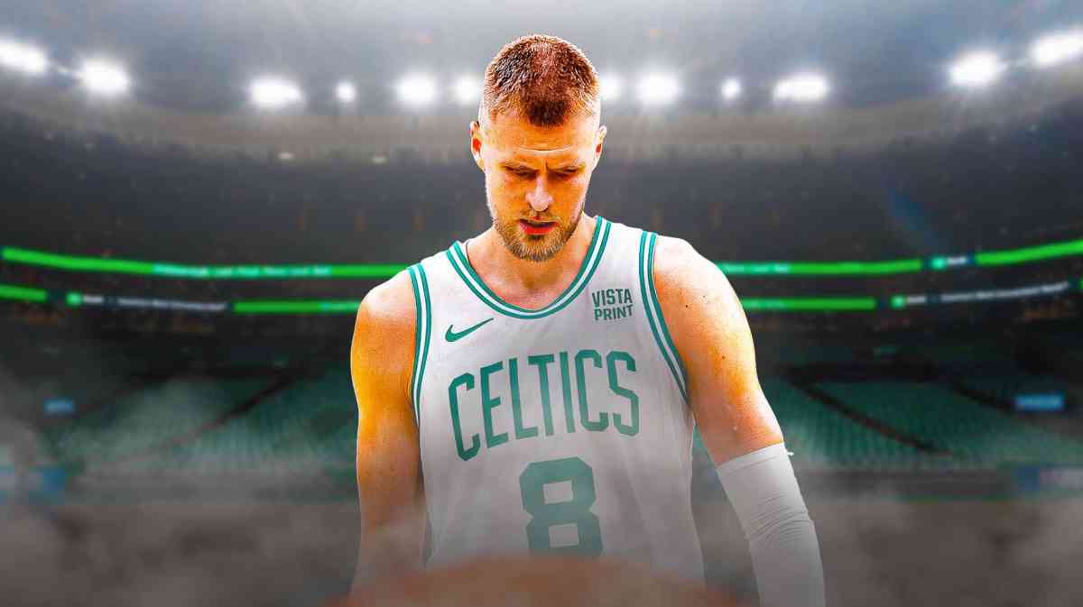 Celtics, Cavaliers, Kristaps Porzingis, Kristaps Porzingis Celtics, Celtics Cavs, Kristaps Porzingis in Celtics uni looking upset with Celtics arena in the background