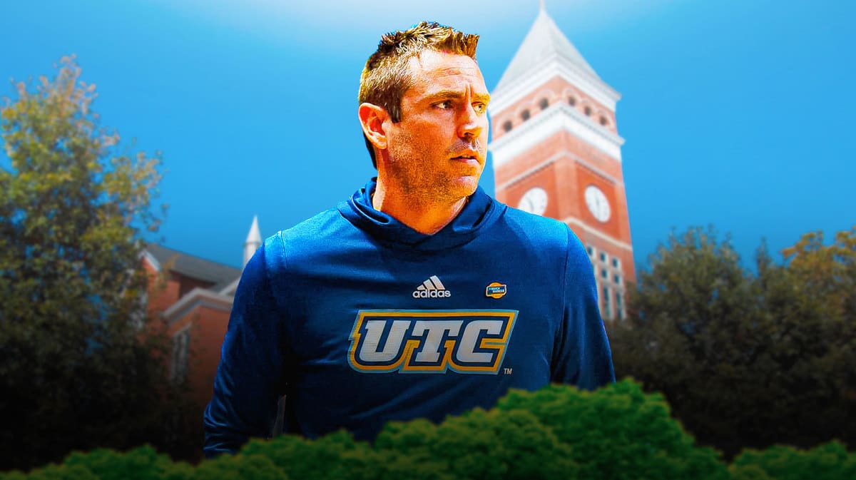 Chattanooga women’s basketball coach Shawn Poppie, with the University of Clemson in the background