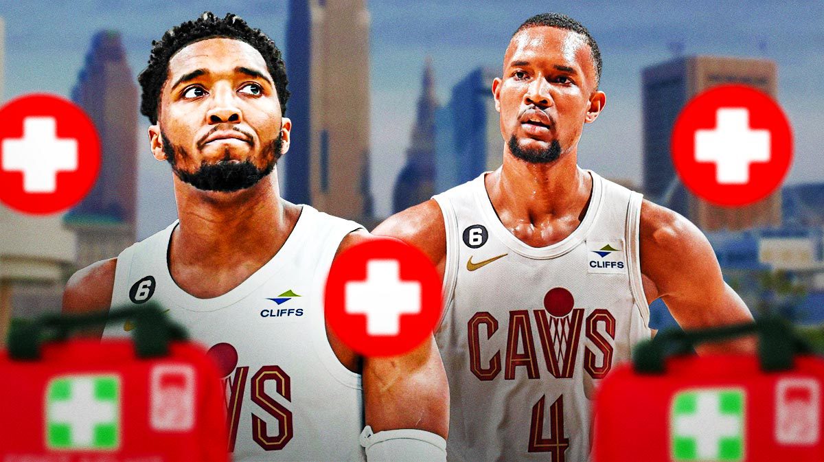 Cavs Donovan Mitchell, Evan Mobley with medical first aid kit in front of them