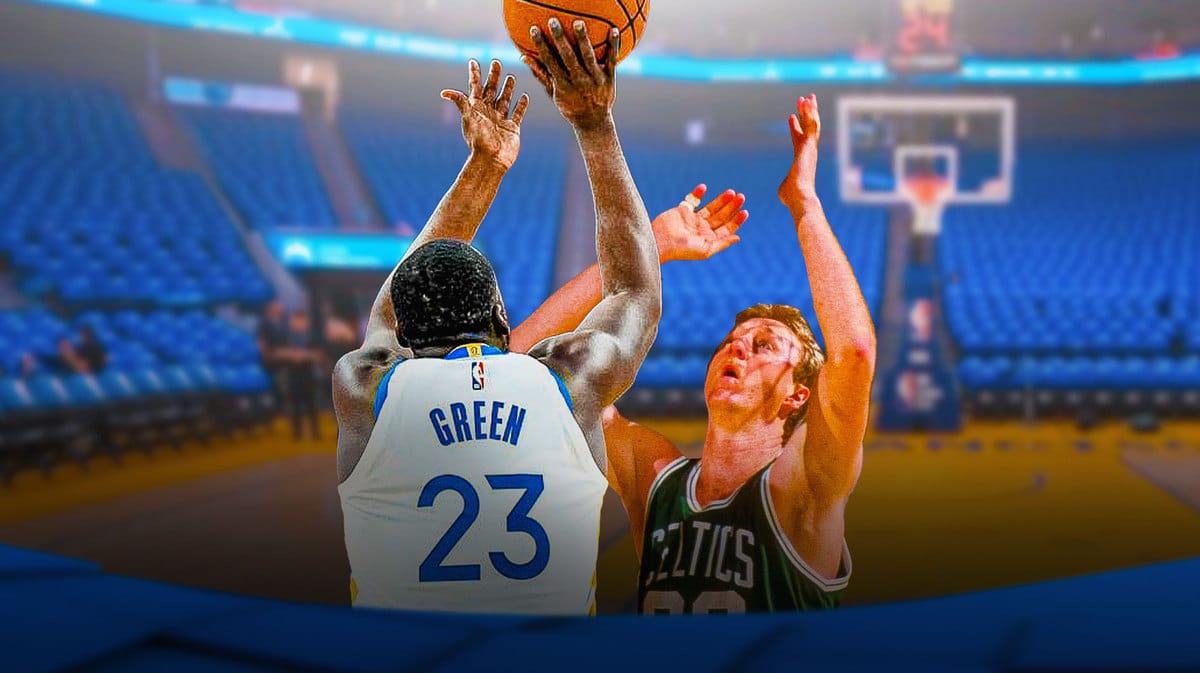 Draymond Green shooting a 3 Larry Bird trying to block the shot.