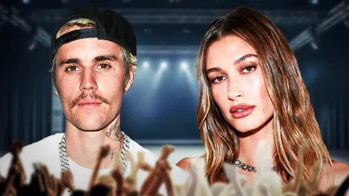 Hailey Bieber and Justin Bieber with a stage behind them