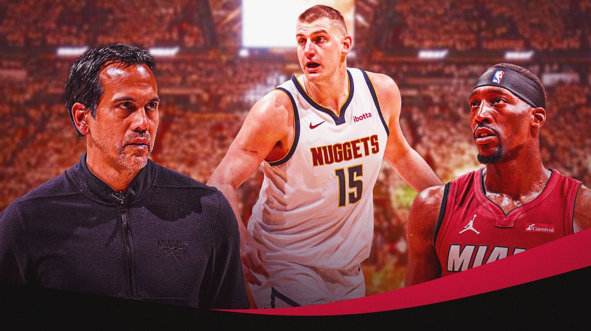 Miami Heat head coach Erik Spoelstra and star Bam Adebayo looking at Denver Nuggets star Nikola Jokic in front of the Kaseya Center.
