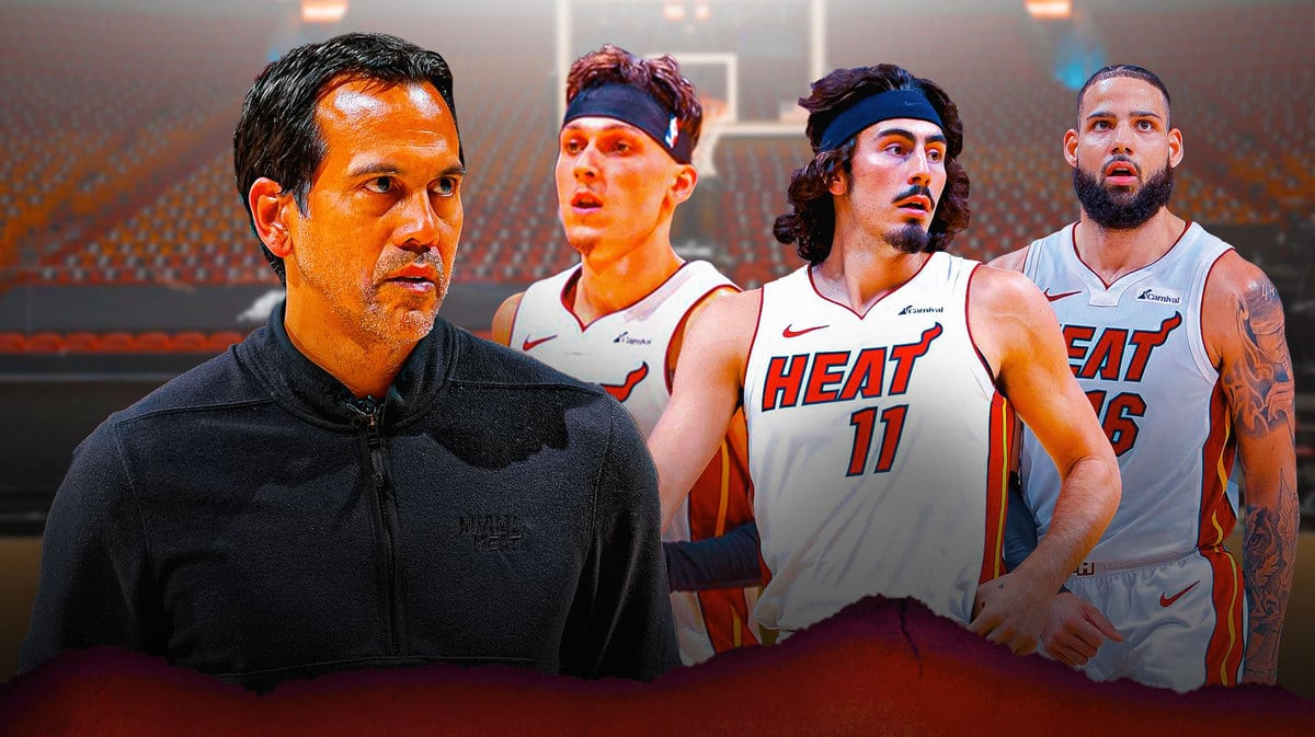 Miami Heat head coach Erik Spoelstra next to stars Jaime Jaquez Jr., Tyler Herro, and Caleb Martin in front of the Kaseya Center.