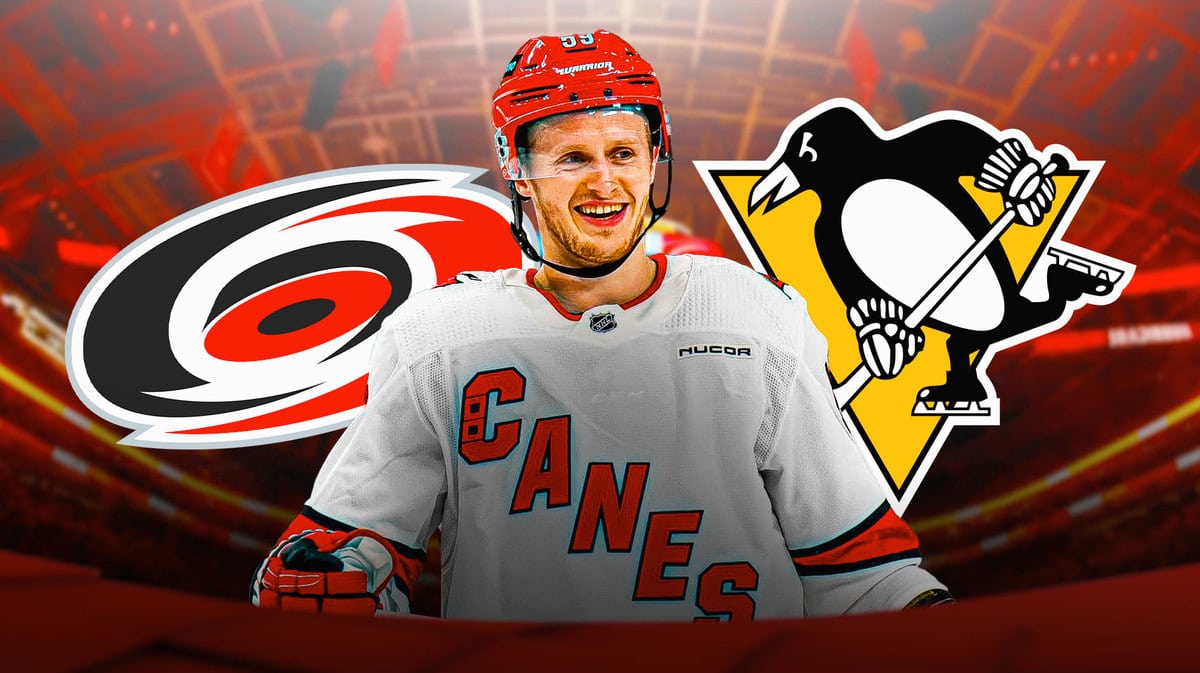 Jake Guentzel in Carolina Hurricanes jersey, Hurricanes logo, Pittsburgh Penguins logo