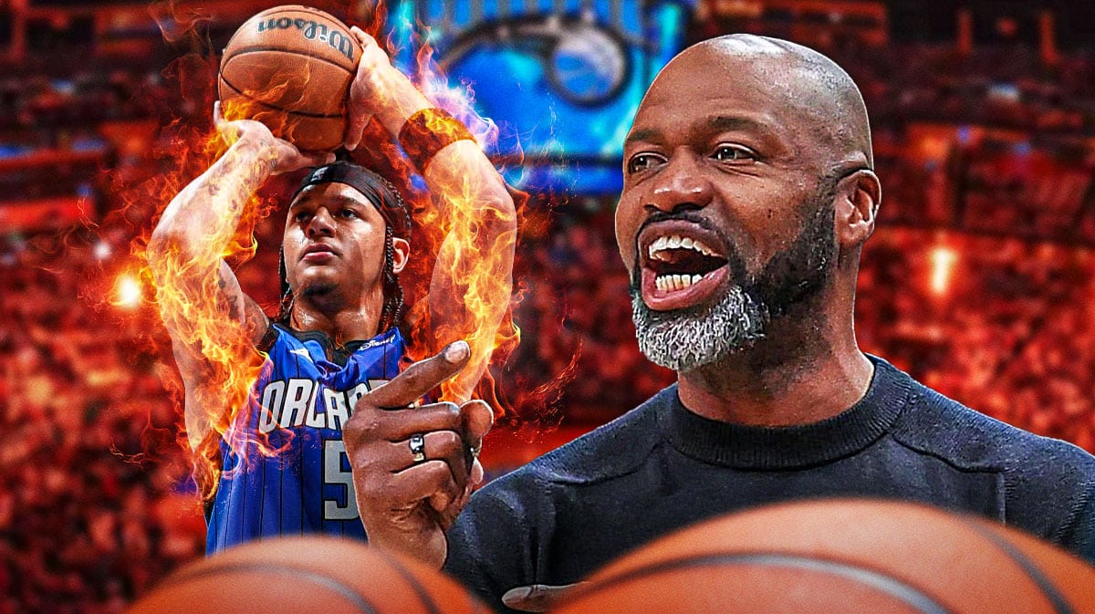 Magic coach Jamahl Mosley looking at Paolo Banchero in flames