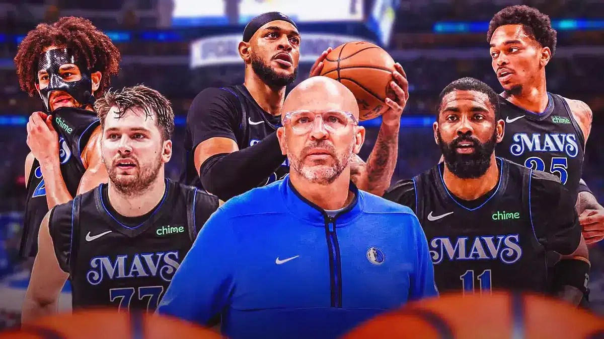 Mavericks' Jason Kidd in front. Mavericks' Luka Doncic on left, Mavericks' Kyrie Irving on right. Mavericks' Dereck Lively II, Mavericks' PJ Washington Jr., and Mavericks' Daniel Gafford in background.