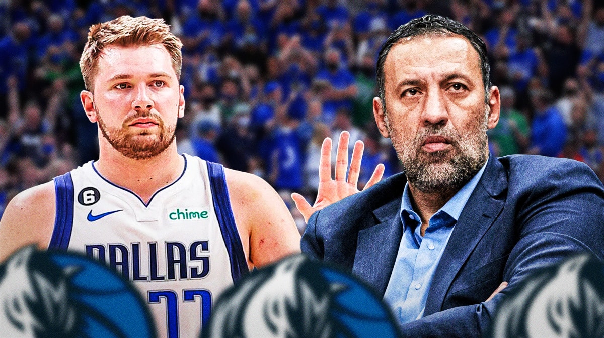 Mavericks' Luka Doncic waving at Vlade Divac