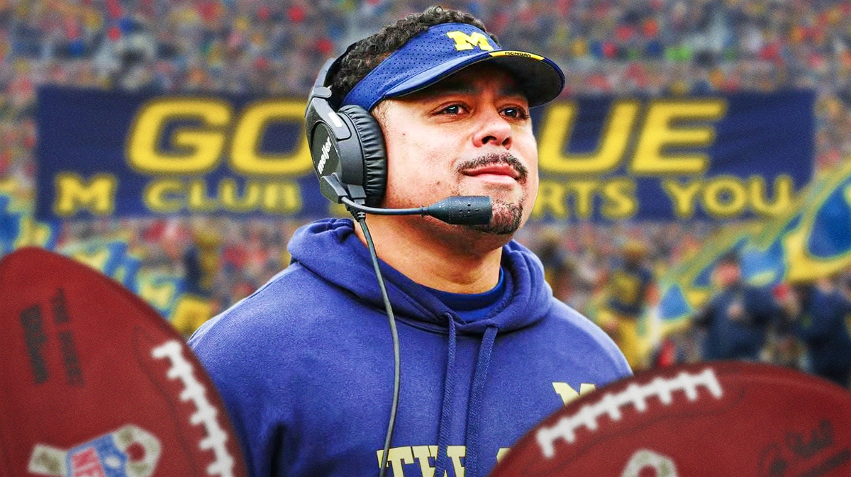 Michigan football, Wolverines, Mike Hart, Mike Hart Michigan, Mike Hart RB Coach, Mike Hart in Michigan gear with Michigan football stadium in the background