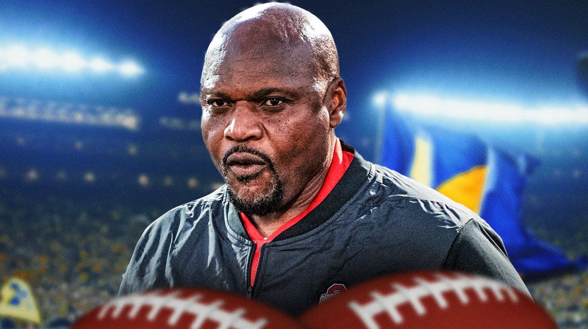 Michigan football, Wolverines, Tony Alford, Ohio State football, Buckeyes, Tony Alford with Michigan Football stadium in the background