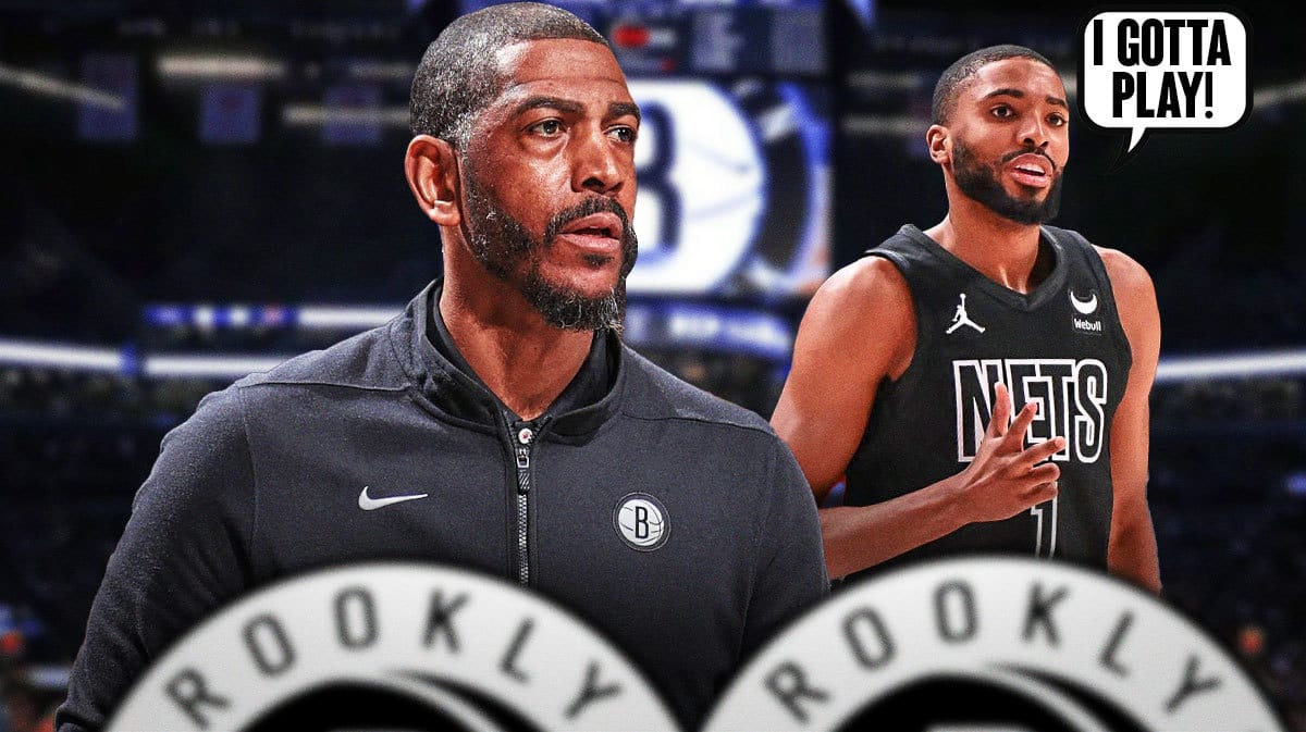 Nets coach Kevin Ollie looking at Mikal Bridges.