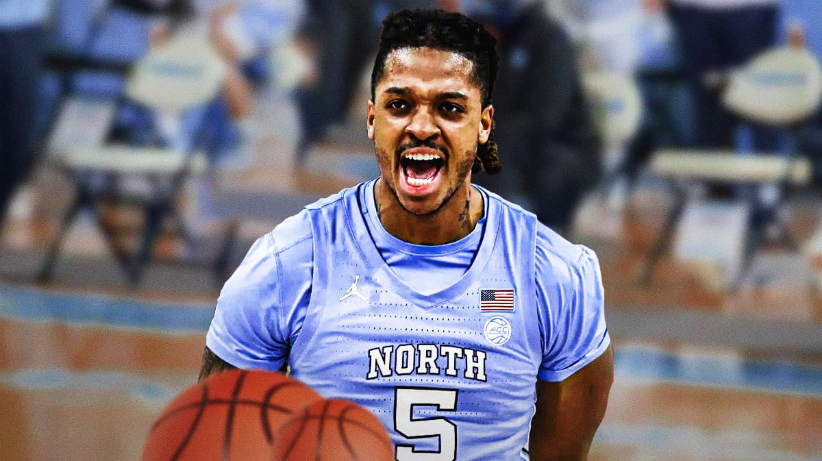 North Carolina basketball star Armando Bacot in front of Roy Williams Court.