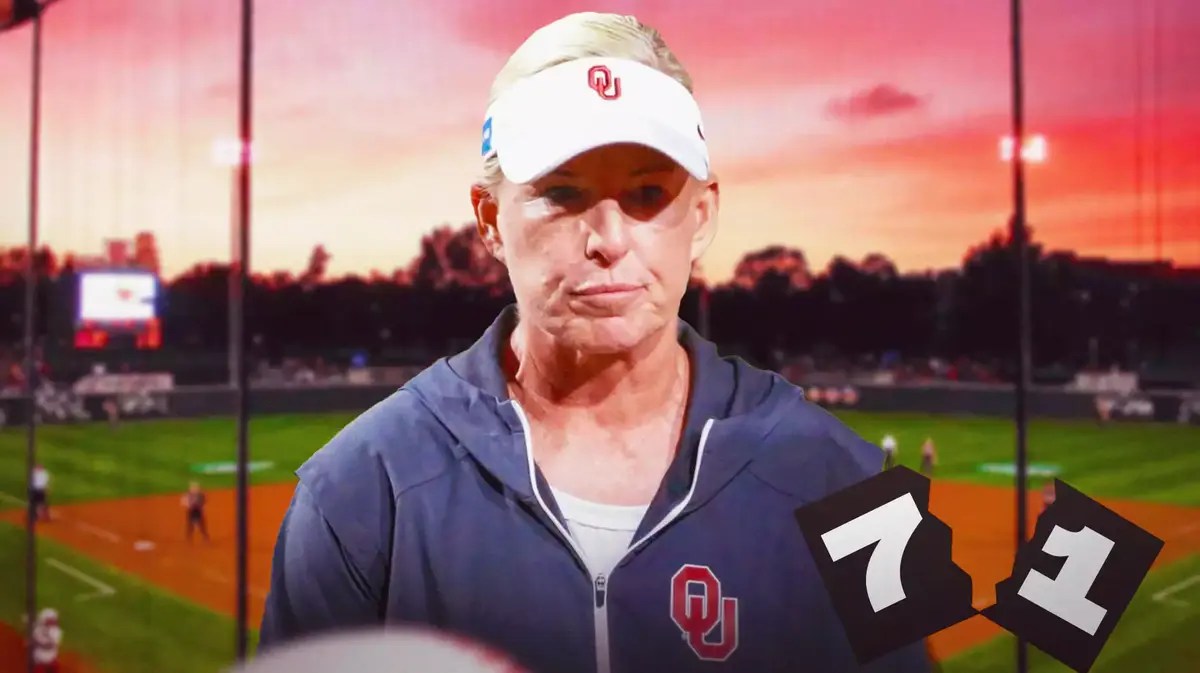 Patty Gasso (Oklahoma women's softball coach) looking serious and with a torn-apart "71"