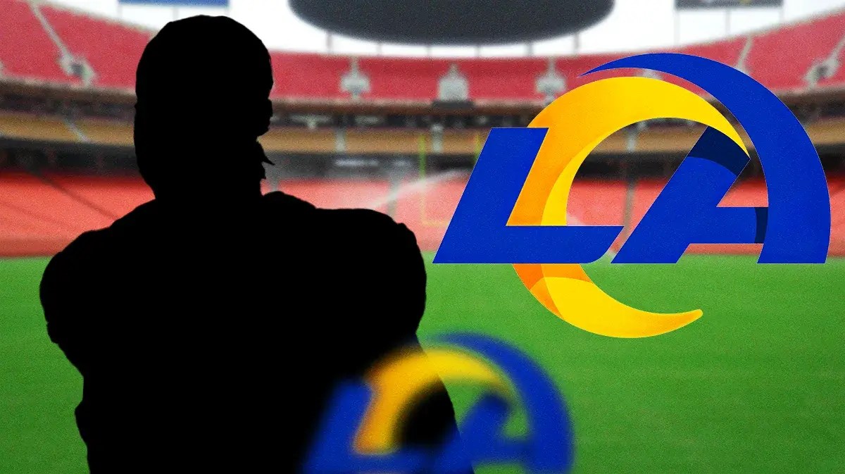 Silhouetted LA Rams player, LA Rams logo, football field in background