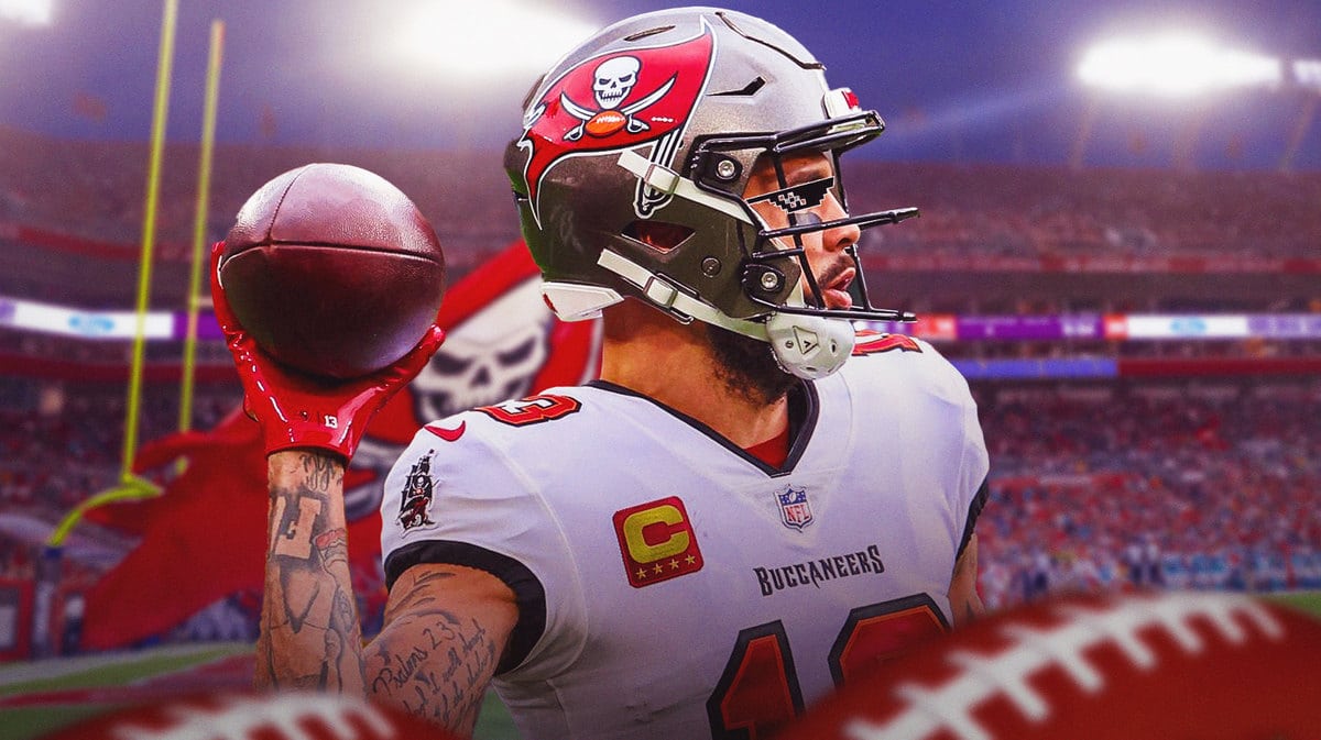 ACTION SHOT of Mike Evans (Buccaneers) with deal with it shades