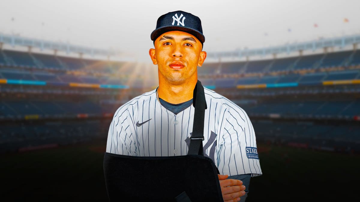 Oswald Peraza with a medical shoulder sling on his right shoulder.