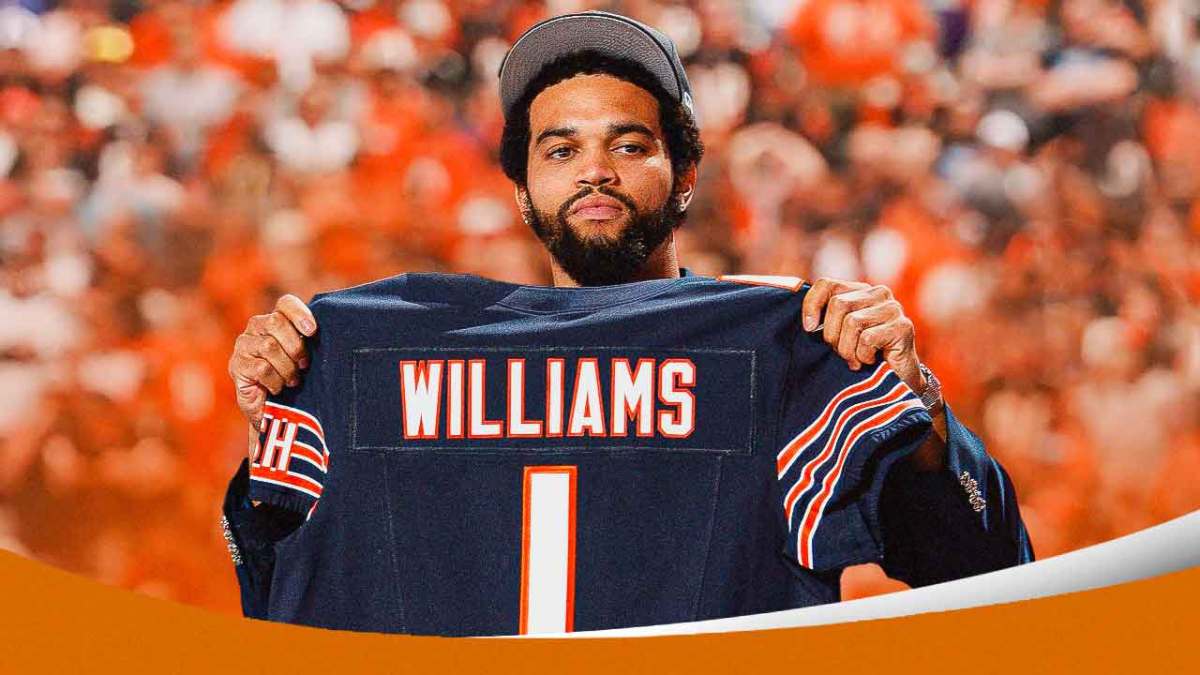 Bears' Caleb Williams holding up 2024 NFL Draft day No. 1 jersey.