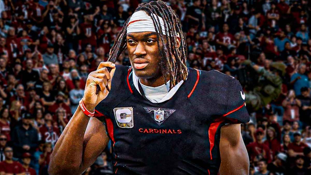 Cardinals, Marvin Harrison Jr., 2024 NFL Draft, Marvin Harrison Jr. Cardinals, Marvin Harrison Jr. predictions, Marvin Harrison Jr. in Cardinals uni with Cardinals stadium in the background