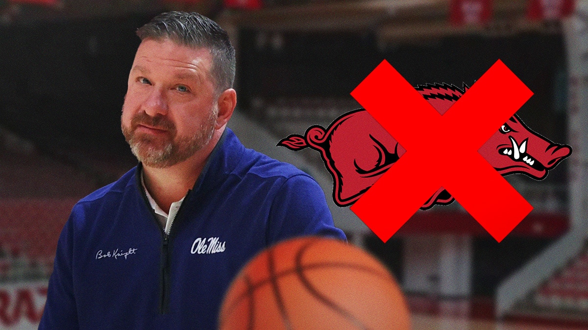 Ole Miss basketball coach Chris Beard next to n Arkansas logo.