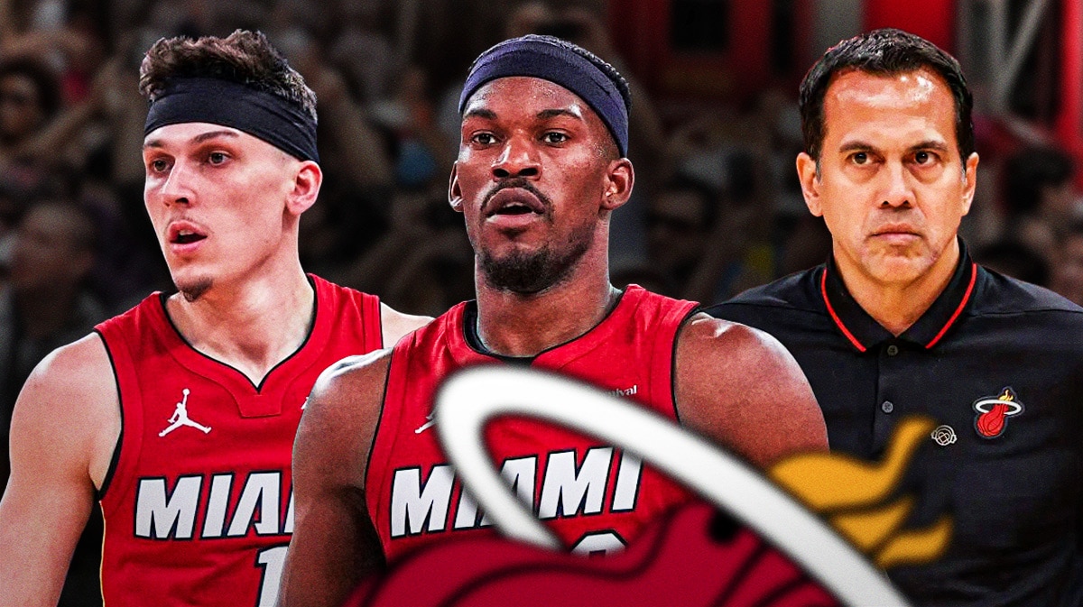 Miami Heat stars Jimmy Butler, Tyler Herro, and head coach Erik Spoelstra in front of the Kaseya Center.