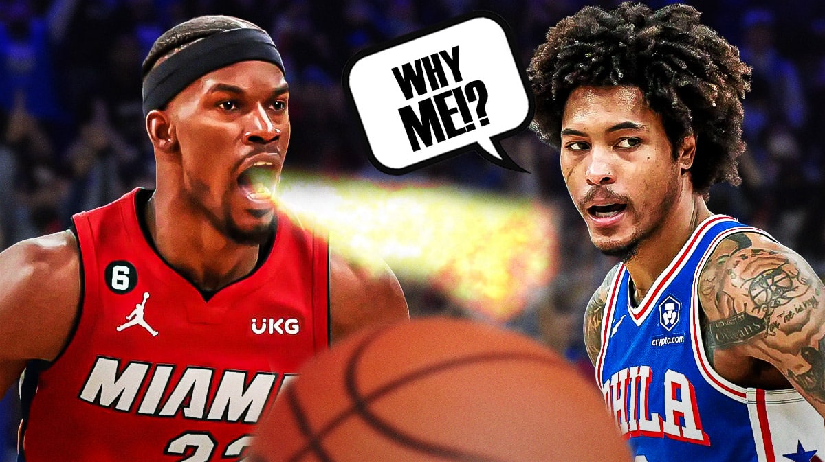 Jimmy Butler on one side breathing fire, Kelly Oubre Jr. on the other side with a speech bubble that says "Why me!?"