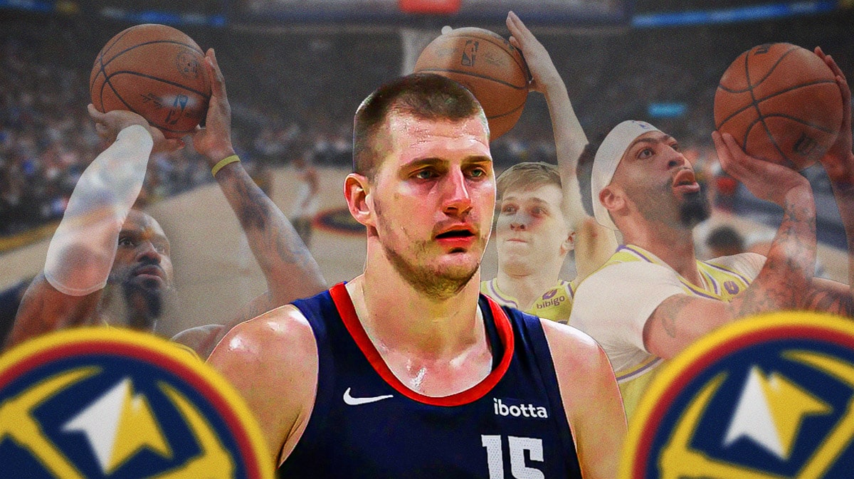 Denver Nuggets center Nikola Jokic with LeBron James, Anthony Davis and Austin Reaves shooting free throws behind him