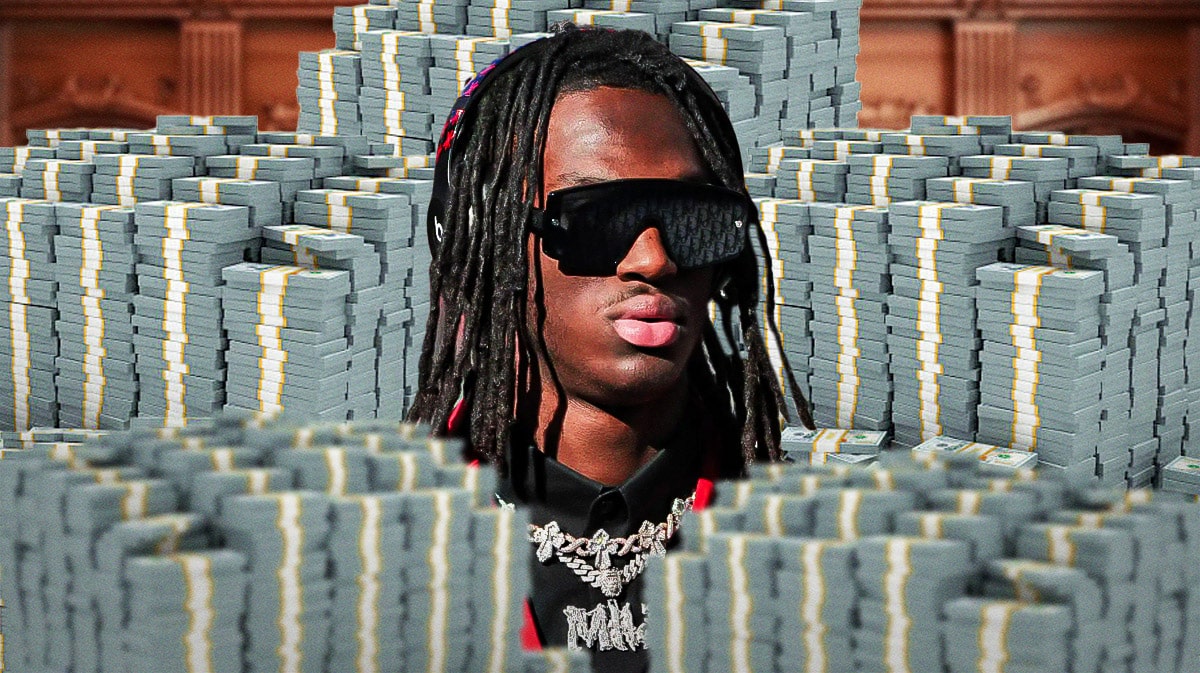 Marvin Harrison Jr. surrounded by piles of cash.