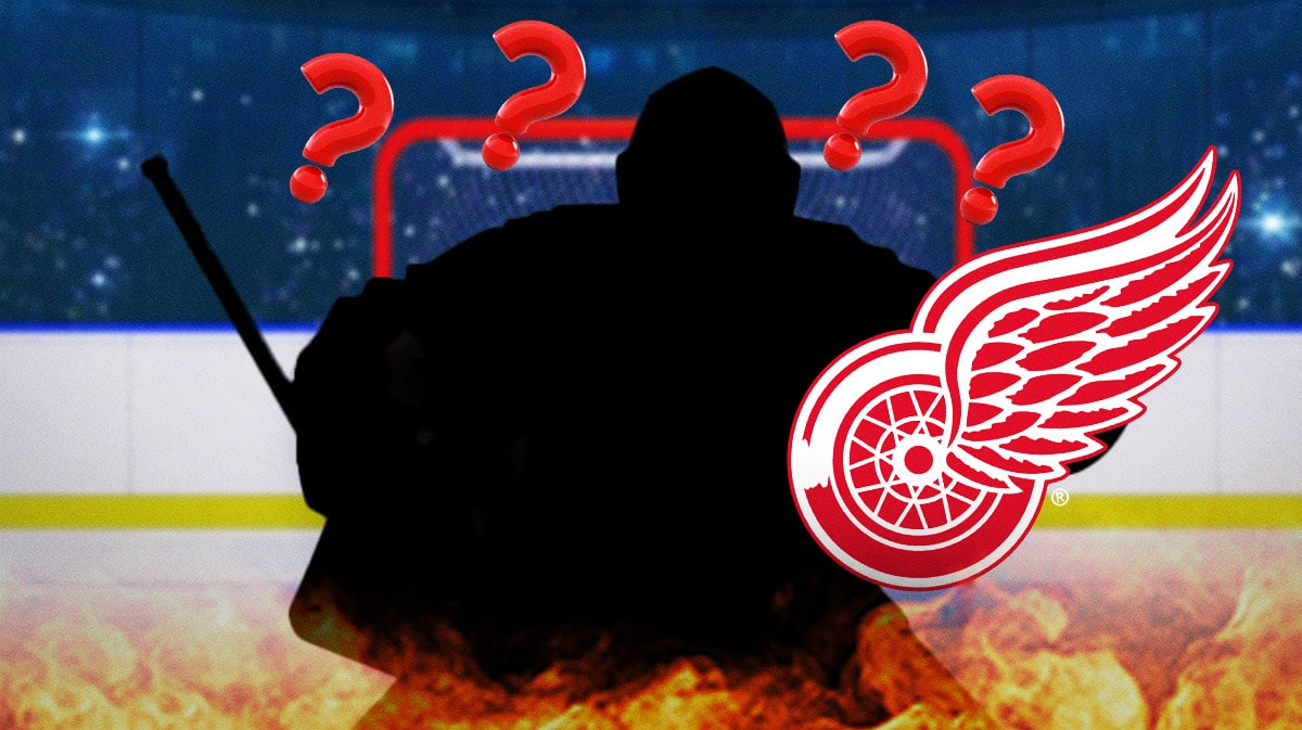 A hockey net with the silhouette of a goalie in front of it, defending the net. The net is surrounded by question marks and next to it is the logo for the Detroit Red Wings.
