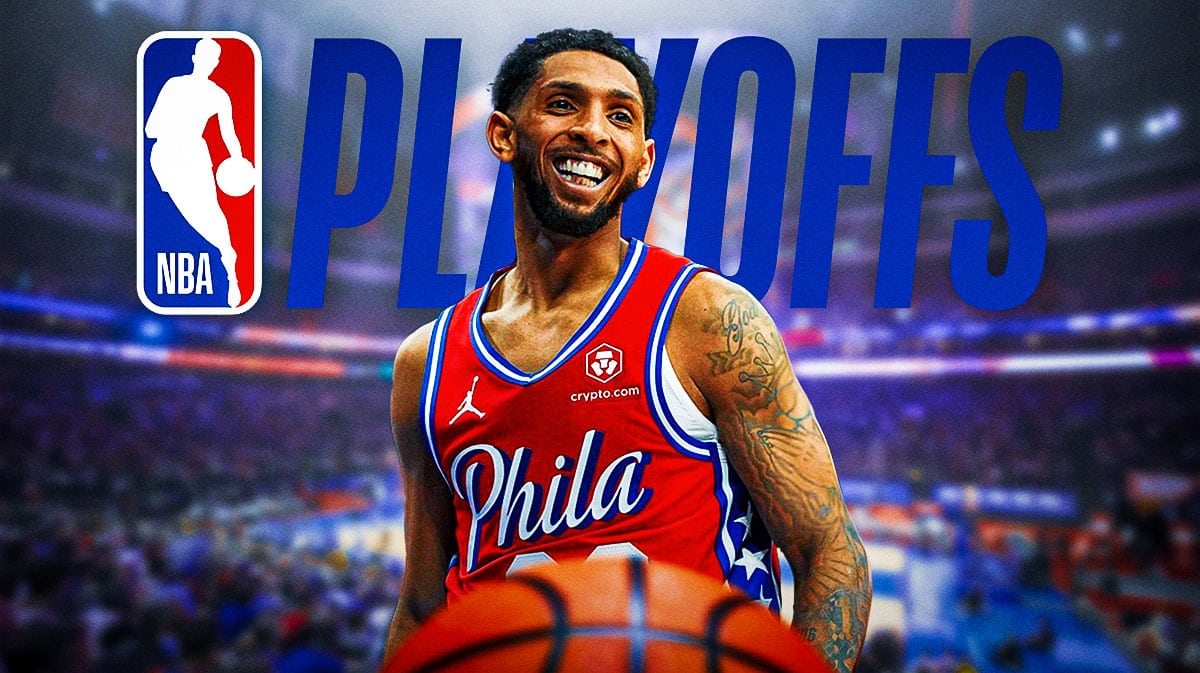 76ers' Cam Payne in front of the NBA playoffs logo