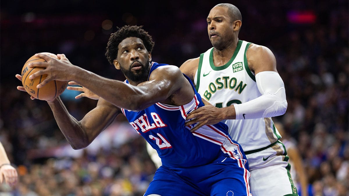 Philadelphia 76ers center Joel Embiid (21) controls the ball against Boston Celtics center Al Horford (42) during the third quarter at Wells Fargo Center.