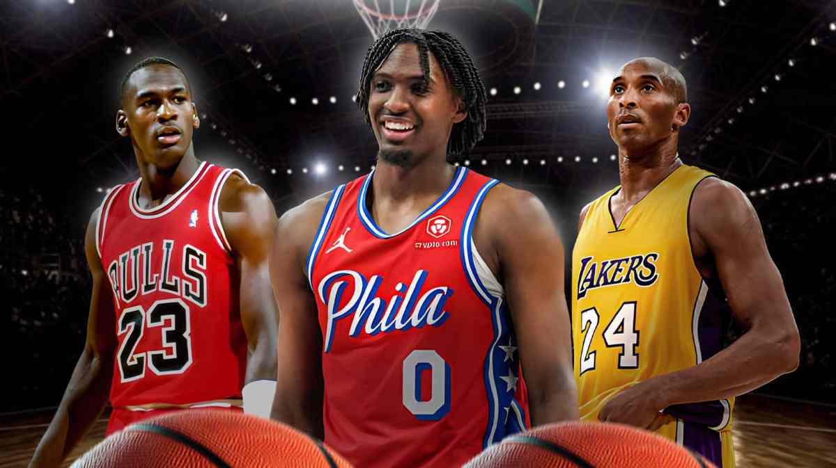76ers' Tyrese Maxey standing in front of Bulls' Michael Jordan and Lakers' Kobe Bryant