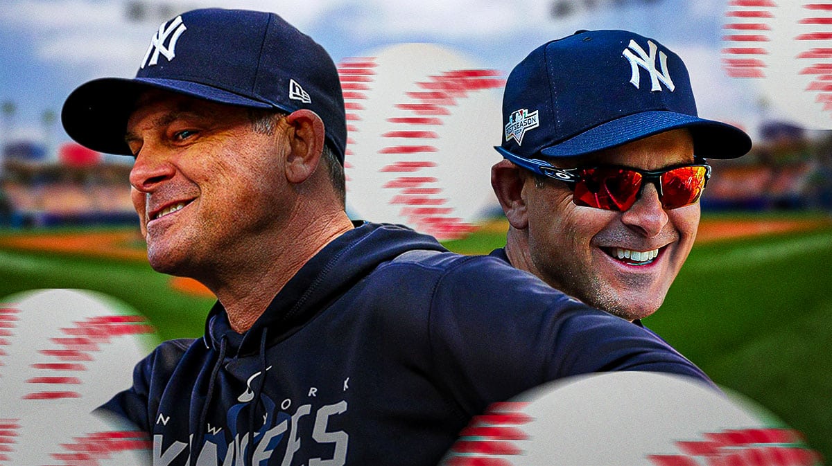 Yankees manager Aaron Boone smiling and happy.
