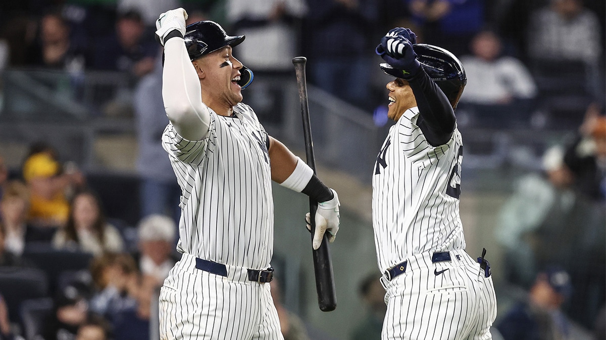 New York Yankees right fielder Juan Soto (22) celebrates with center fielder Aaron Judge (99) after hitting a solo home run in the sixth inning against the Oakland Athletics at Yankee Stadium.