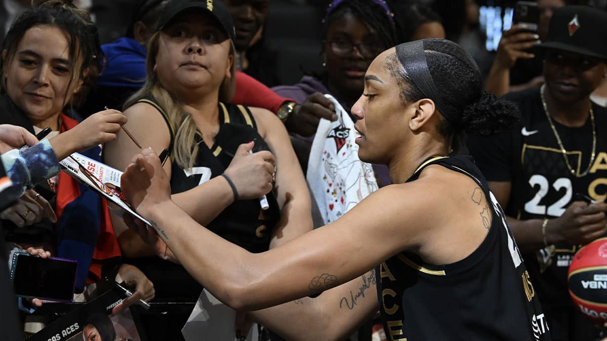 Las Vegas Aces forward A'ja Wilson (22) signs autographs after defeating the Dallas Wings in game two of the 2023 WNBA Playoffs.