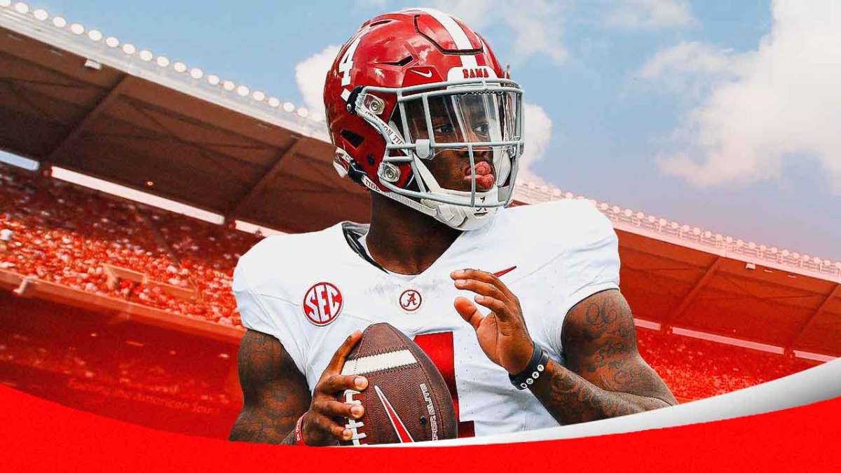 Alabama football star Jalen Milroe in front of Bryant-Denny Stadium.