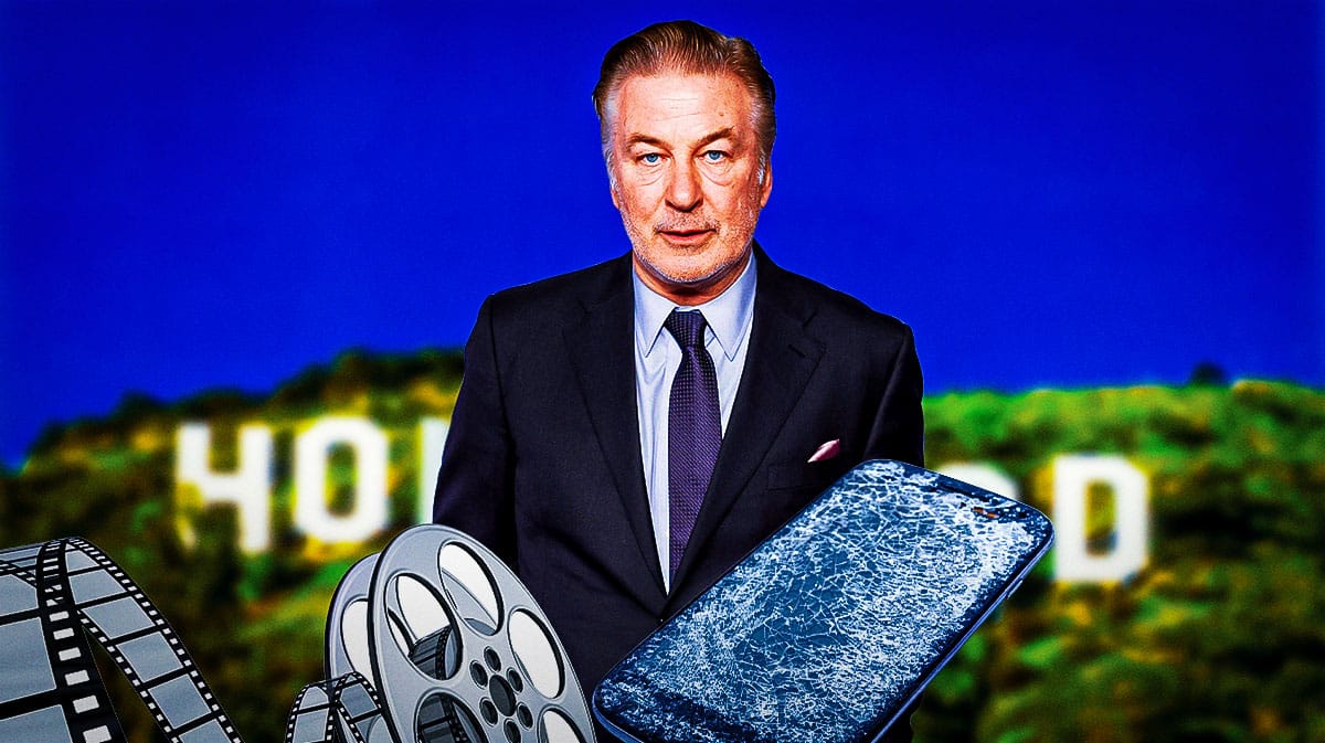 Alec Baldwin with a phone.