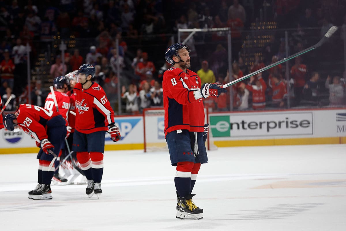 Apr 28, 2024; Washington, District of Columbia, USA; Washington Capitals left wing Alex Ovechkin (8) offers his stick to a young fan prior to leaving the ice after the Capitals game against the New York Rangers in game four of the first round of the 2024 Stanley Cup Playoffs at Capital One Arena.