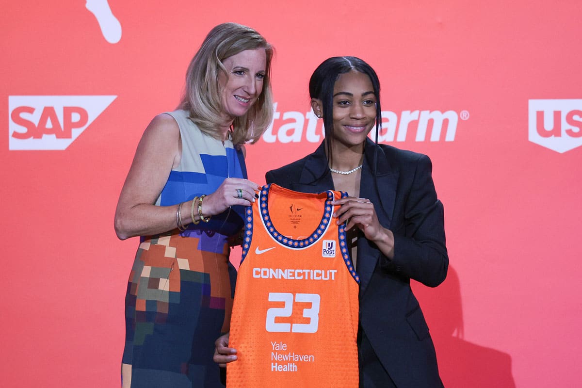 Alexis Morris poses for a photo with WNBA Commissioner Cathy Engelbert after being drafted twenty-second overall by the Connecticut Sun during WNBA Draft 2023.