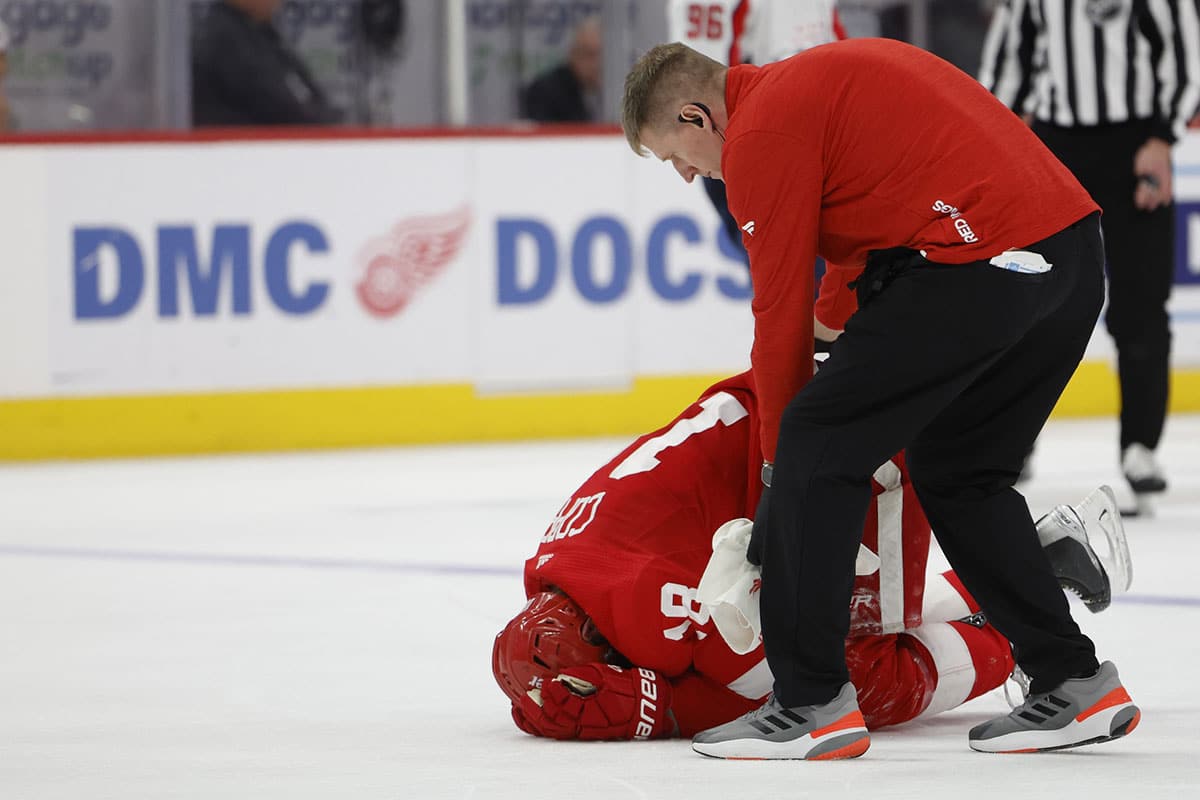  Detroit Red Wings center Andrew Copp (18) is checked on after get injured in the third period against the Washington Capitals at Little Caesars Arena